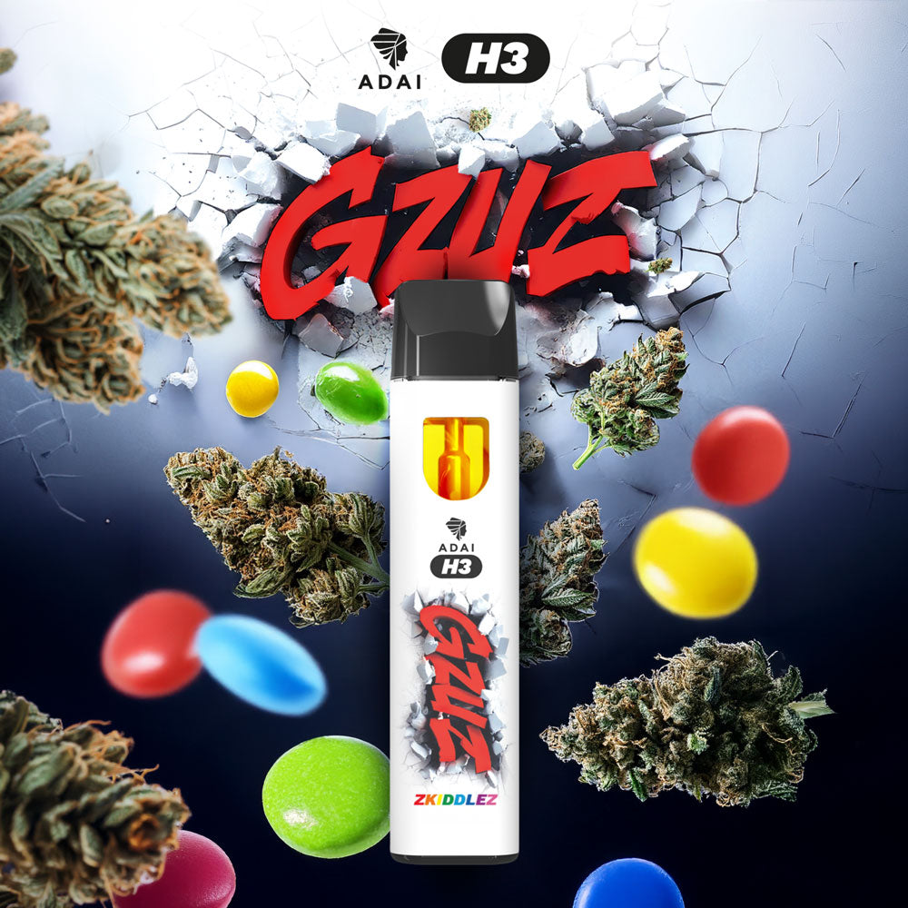 GZUZ H3 Vape Zkittlez, weißer Vape Pen vor rotem GZUZ Logo, bunte Bonbons und Blüten