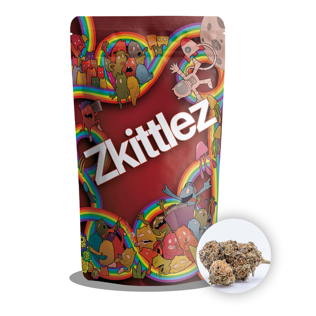 Canatrava CBD Zkittlez Verpackung mit buntem Comicdesign, Regenbogenmotiv und Blütenvorschau auf hellem Hintergrund